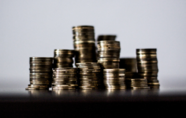 A stock image of stacked money coins