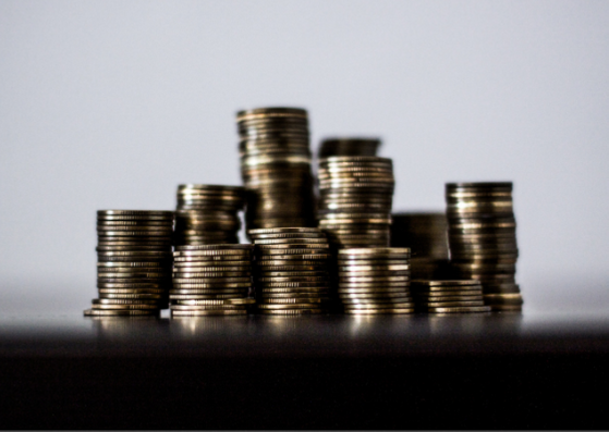 A stock image of stacked money coins