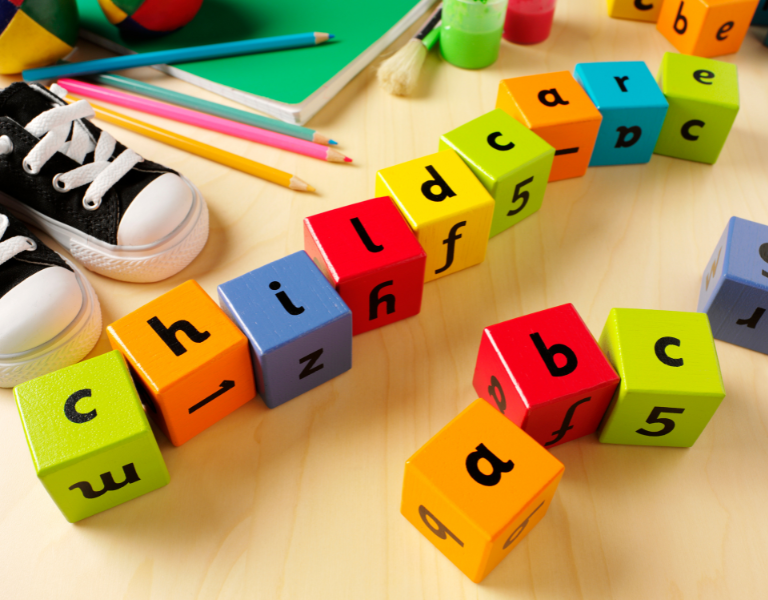 Stockshot of building blocks spelling the word Childcare