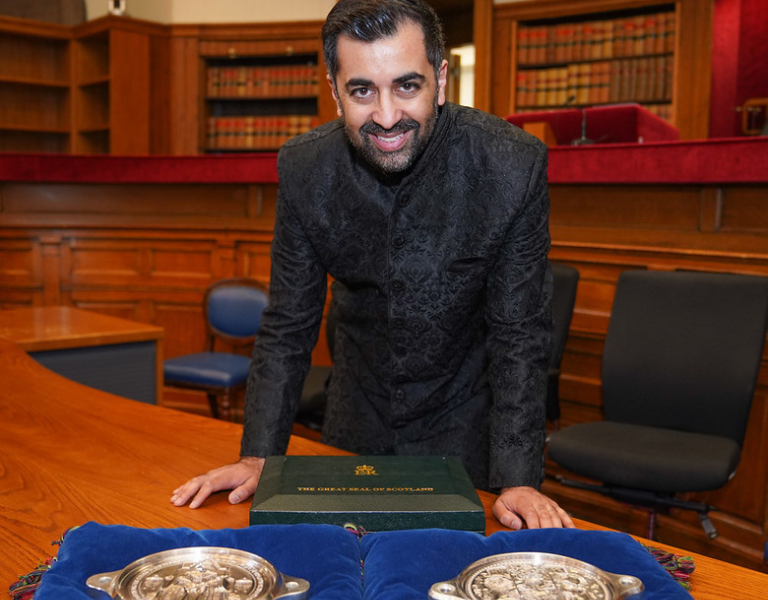 Humza Yousaf receiving the Great Seal of Scotland after taking the oath as First Minister.