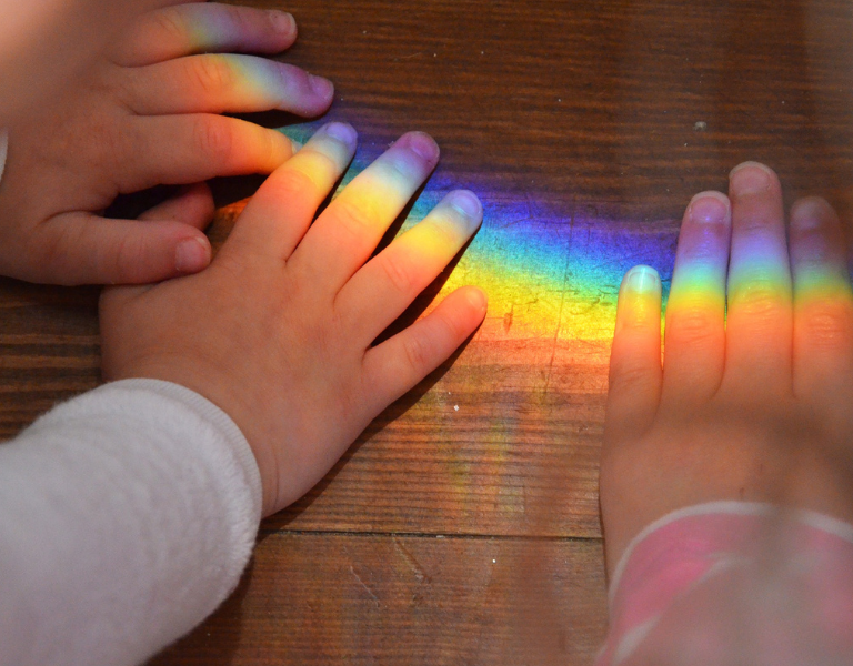 Stock image - A rainbow on children's hands