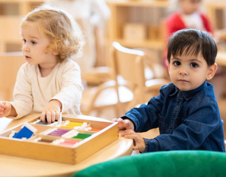 A stock image of two young children in childcare.