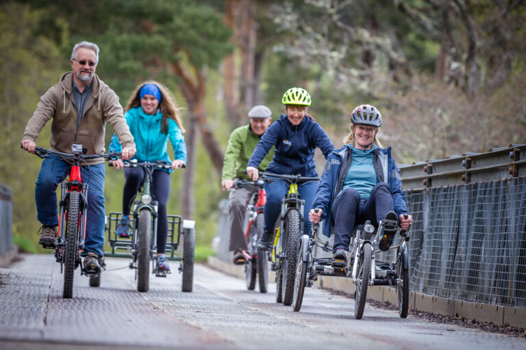 A stock photo of a family out cycling