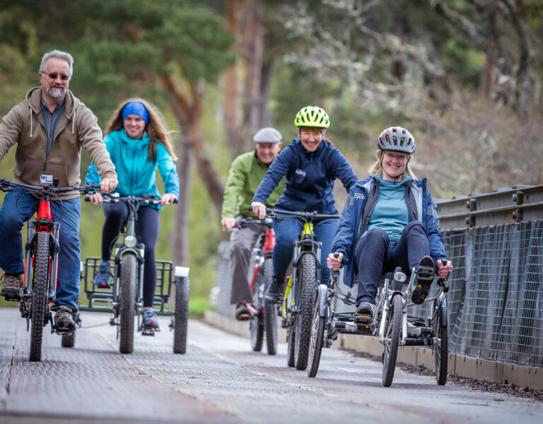 A stock photo of a family out cycling
