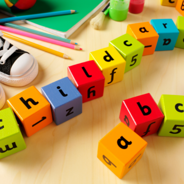 Stockshot of building blocks spelling the word Childcare