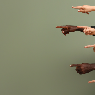 A stock image of fingers pointing at someone, to represent stigma and discrimination